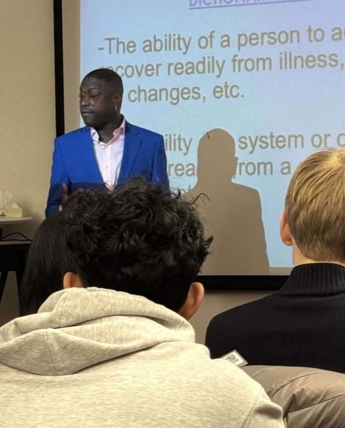 Kyreé Miller presenting to a classroom of students at Hult International Business School in 2022